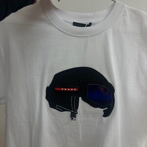 Prada White Tee with Black and Red Helmet Graphic